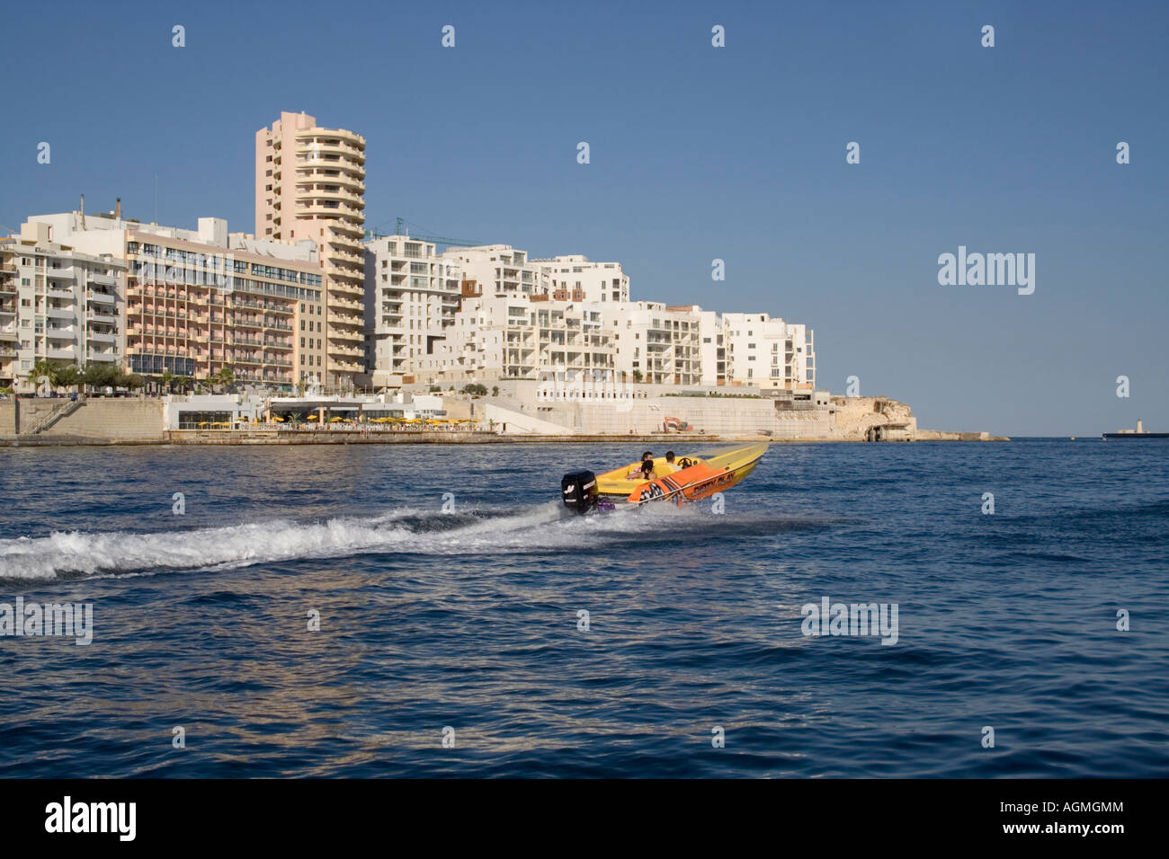 Speedboat off Sliema seafront, Malta Stock Photo