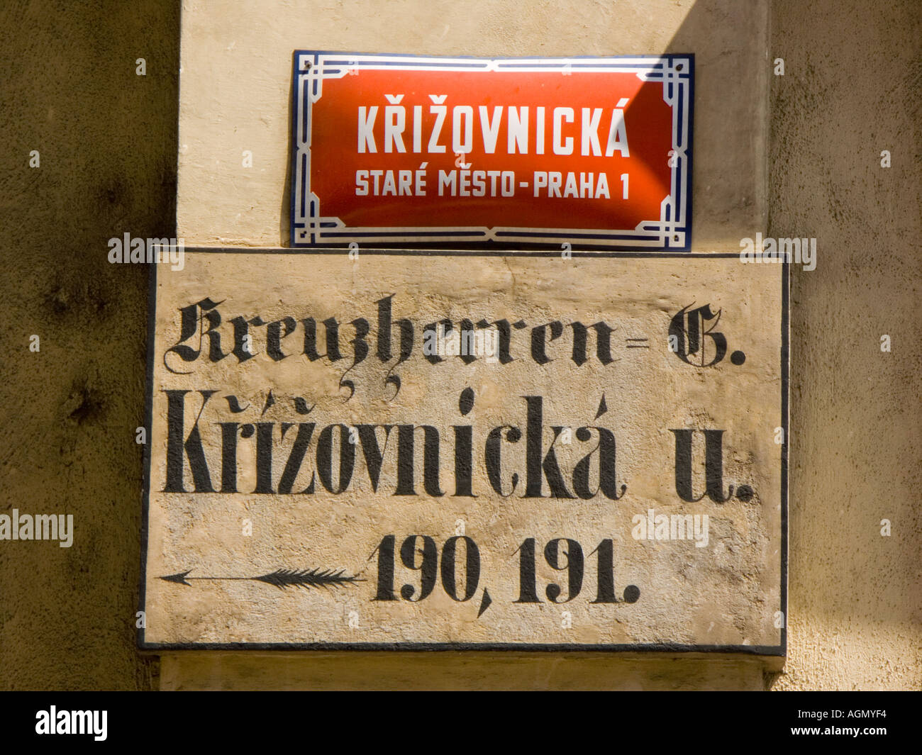 Old and new street signs with blackletter gothic German Czech and modern typography Prague Stock Photo