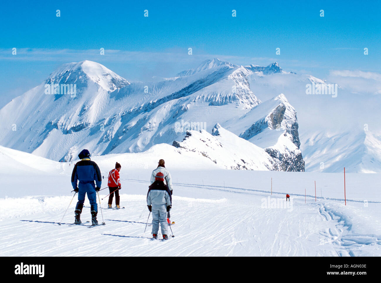 Family group of skiers with their instructor on the slopes Zermatt Switzerland  Stock Photo