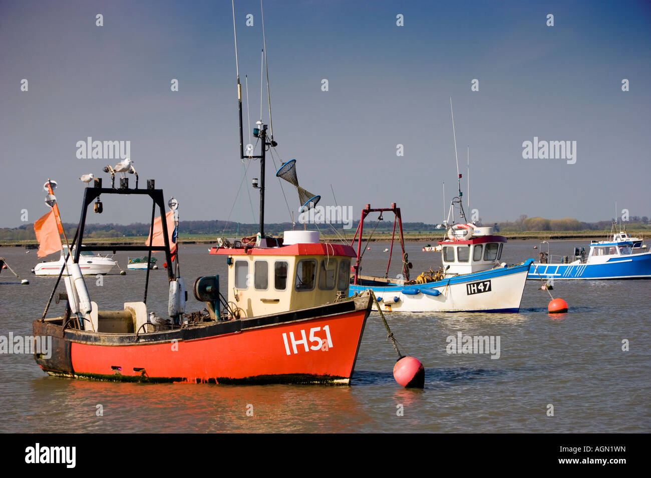 Fishing boats moored on the River Deben, Felixstowe Ferry, England