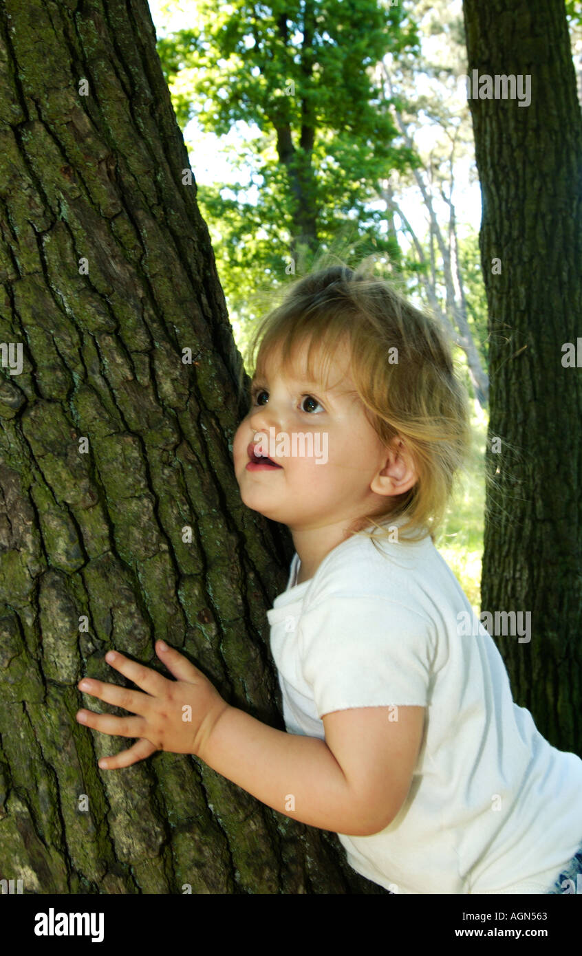 portrait of a sweet cute little girl outside Stock Photo - Alamy