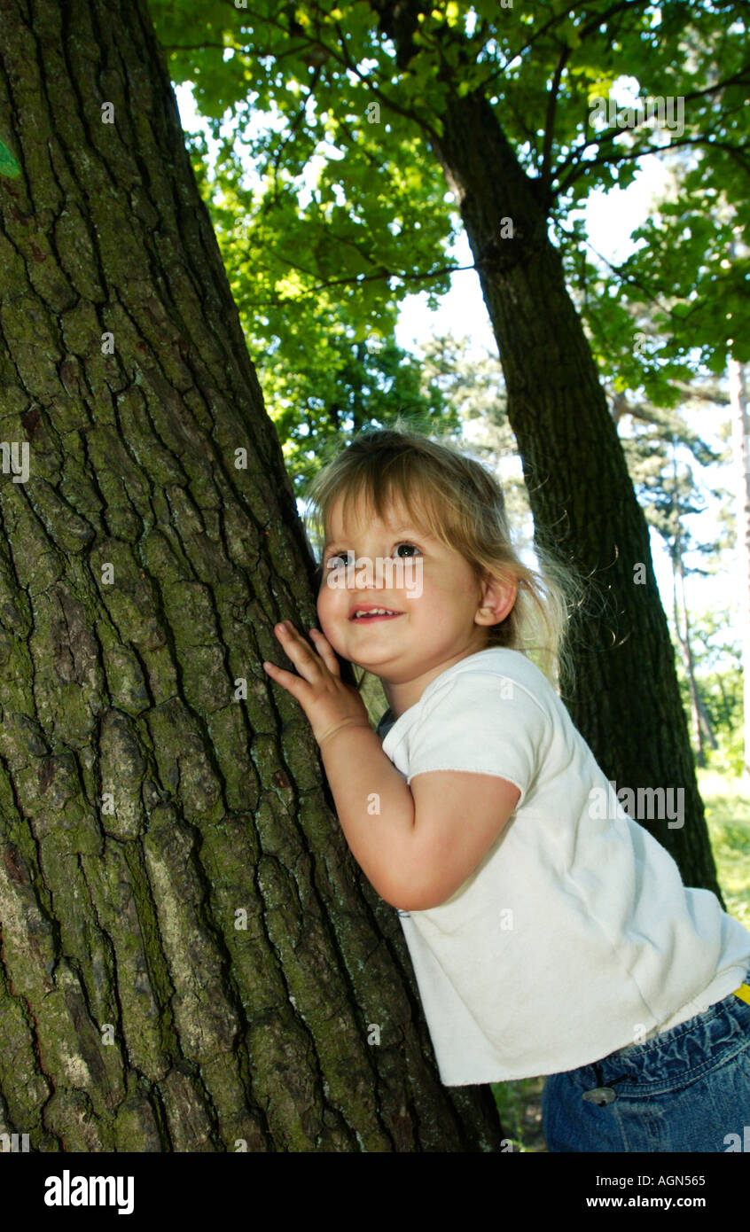 portrait of a sweet little girl outside Stock Photo - Alamy