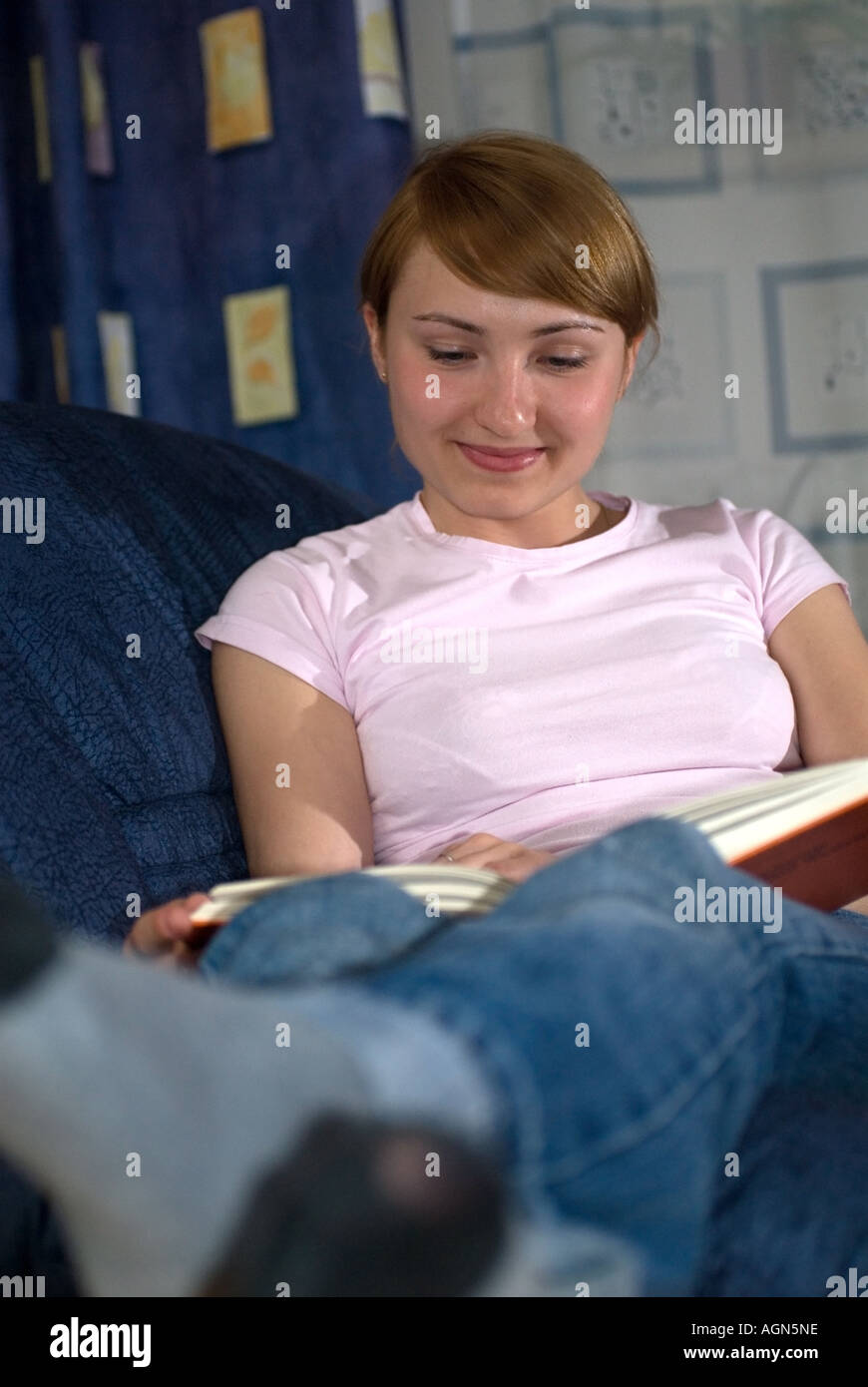young girl reading science book Stock Photo - Alamy