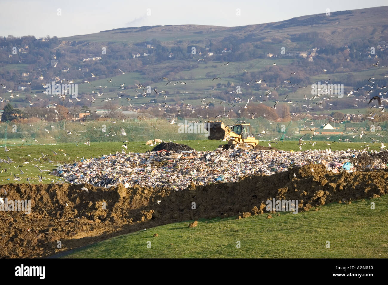 Bulldozer working on landfill site in Cotswolds Wingmoor Site Cory Environmental UK Stock Photo