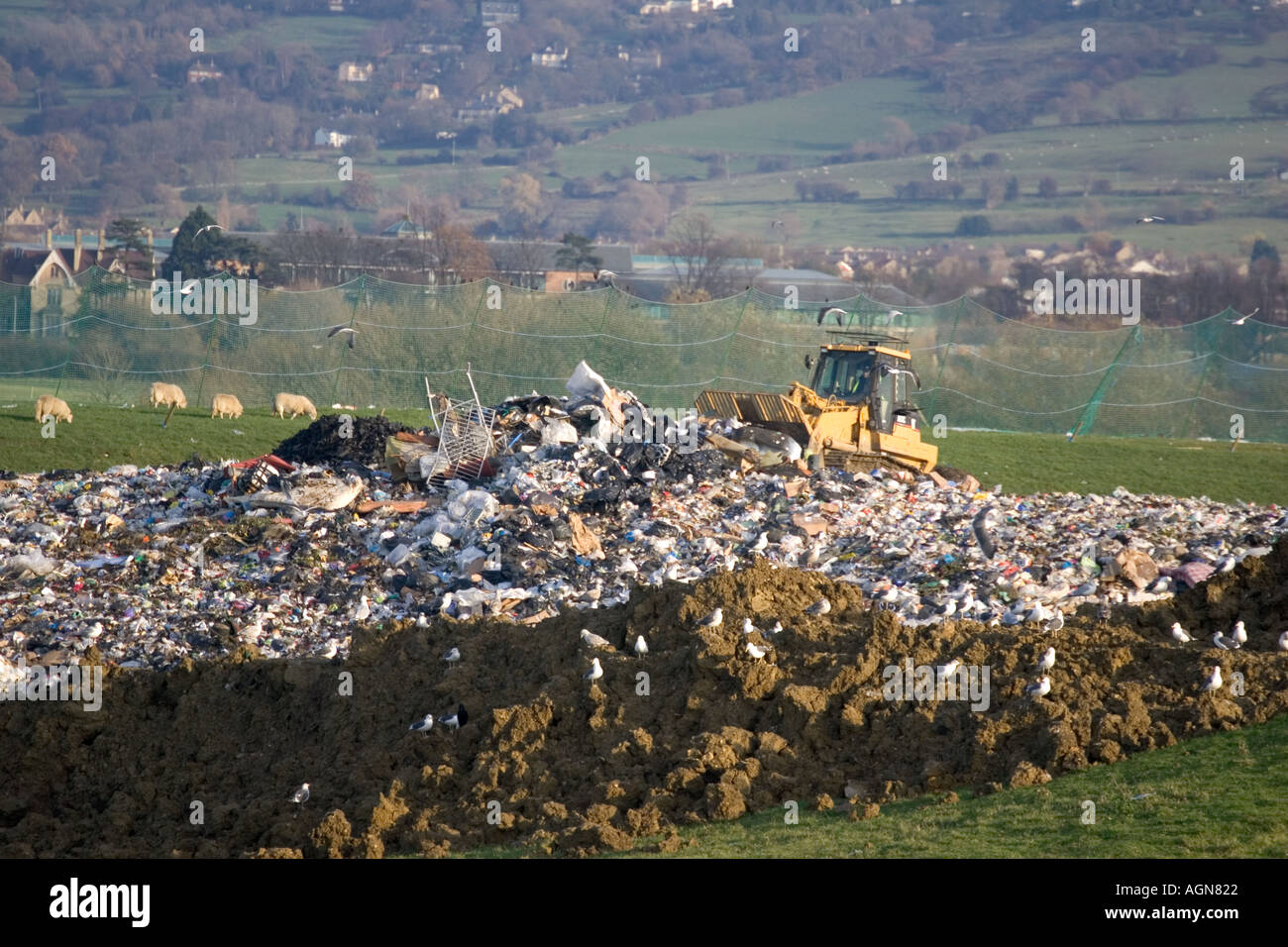Bulldozer working on landfill site at Wingmoor Farm Cory Environmental Cotswolds UK Stock Photo
