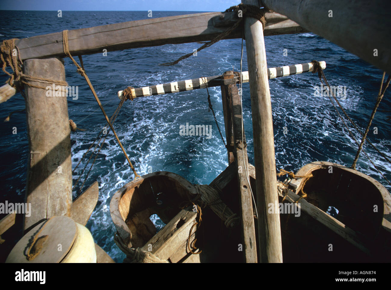 Lashed aft of an Arab dhow are the openair toilet boxes or zuli Stock Photo