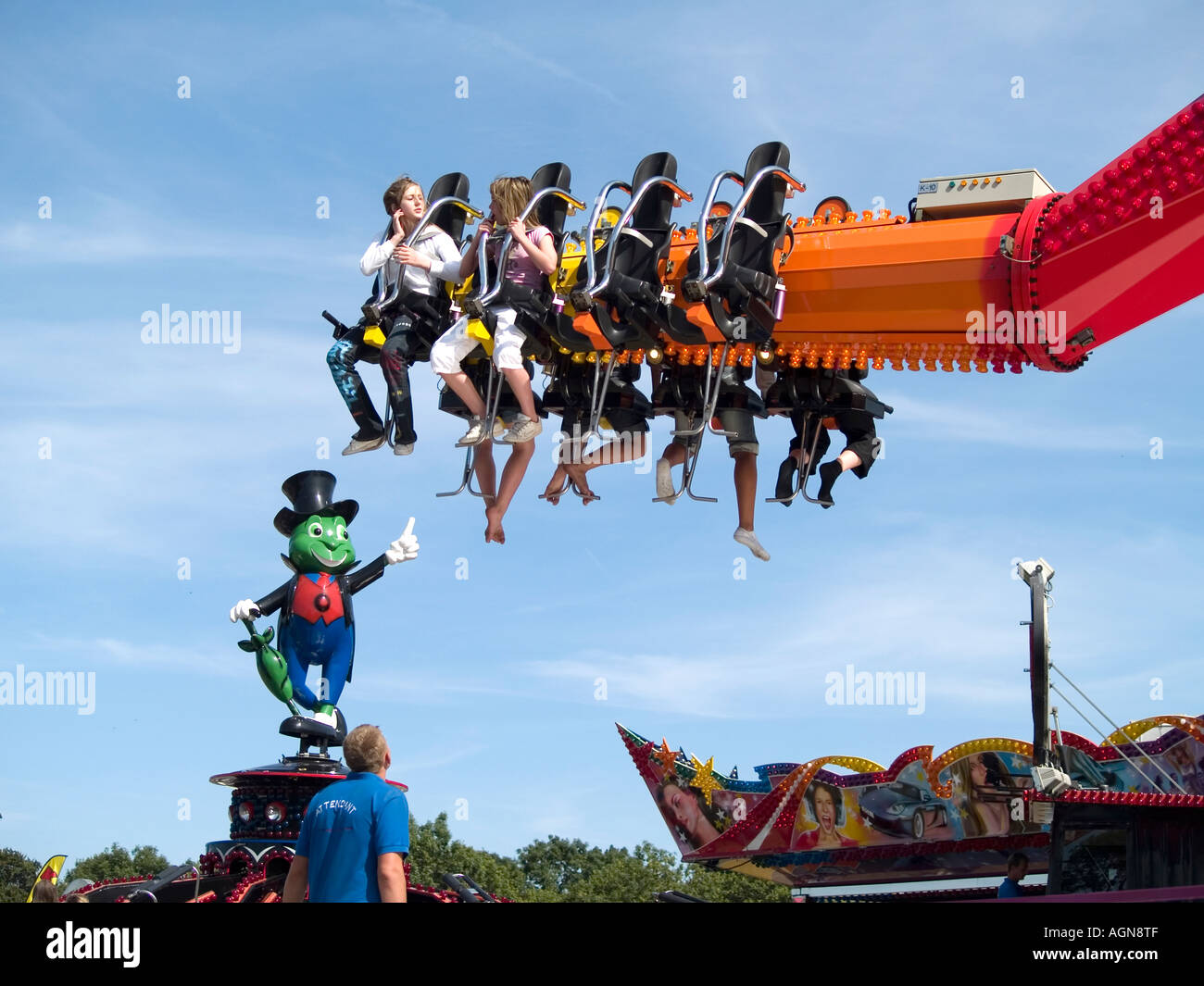Fairground ride at Kirkleatham Redcar Cleveland UK, with a green man apparently pointing at riders 2006 Stock Photo
