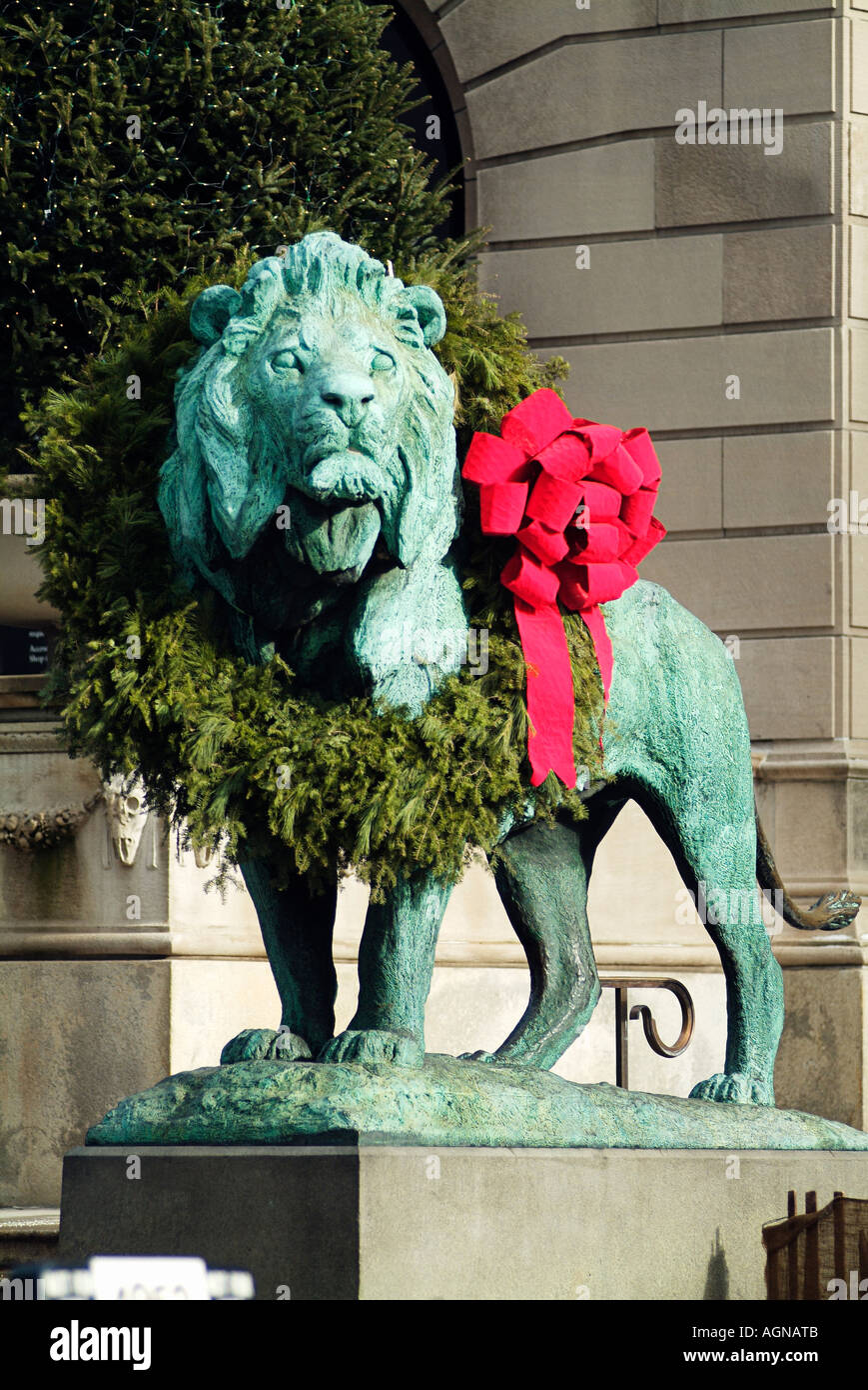 A Bronze Lion Statue With Wreaths Outside the Art Institute of Chicago Stock Photo