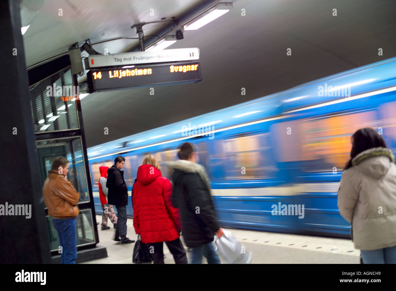 Train leaving subway Tunnelbana station platform in Stockholm Sweden Stock Photo