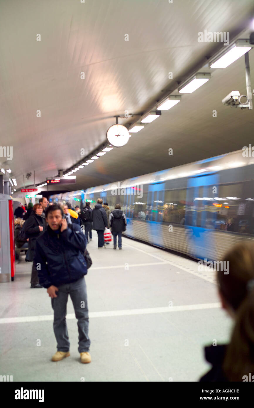 Train leaving subway Tunnelbana station platform in Stockholm Sweden Stock Photo