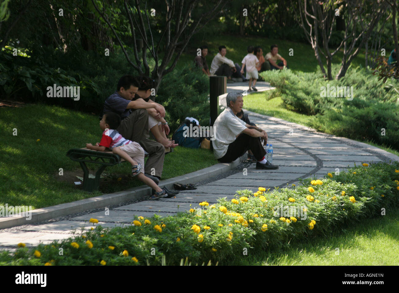 Summer in Beijing is hot and the people go to the parks to find coolness China August 2007 Stock Photo