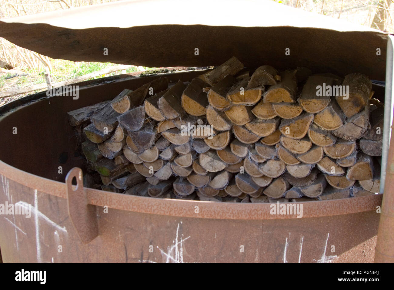 Charcoal burner loaded with wood Stock Photo Alamy