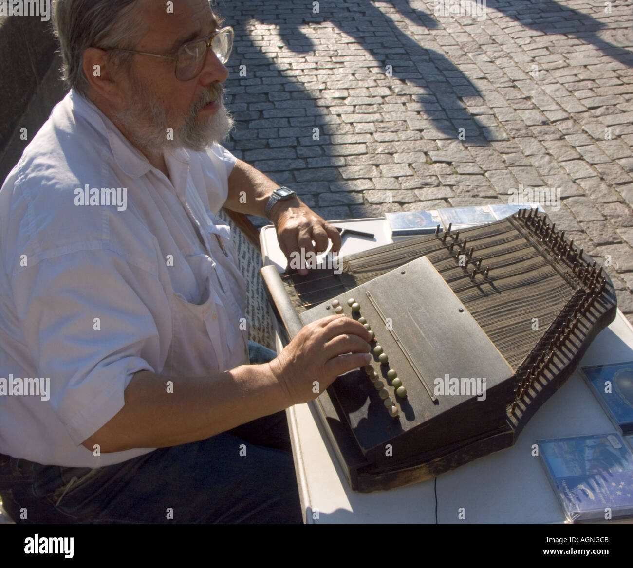 Keyed zither player Jiri Klenha on Charles Bridge Prague Summer 2005 he