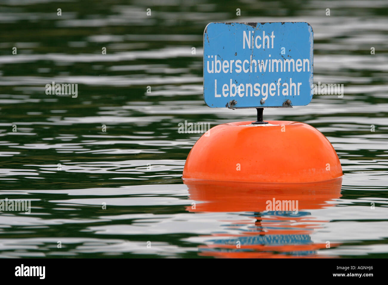 Oberschleissheim, GER, 08. July 2006 - A buoy warns of dangerous swimming. Stock Photo
