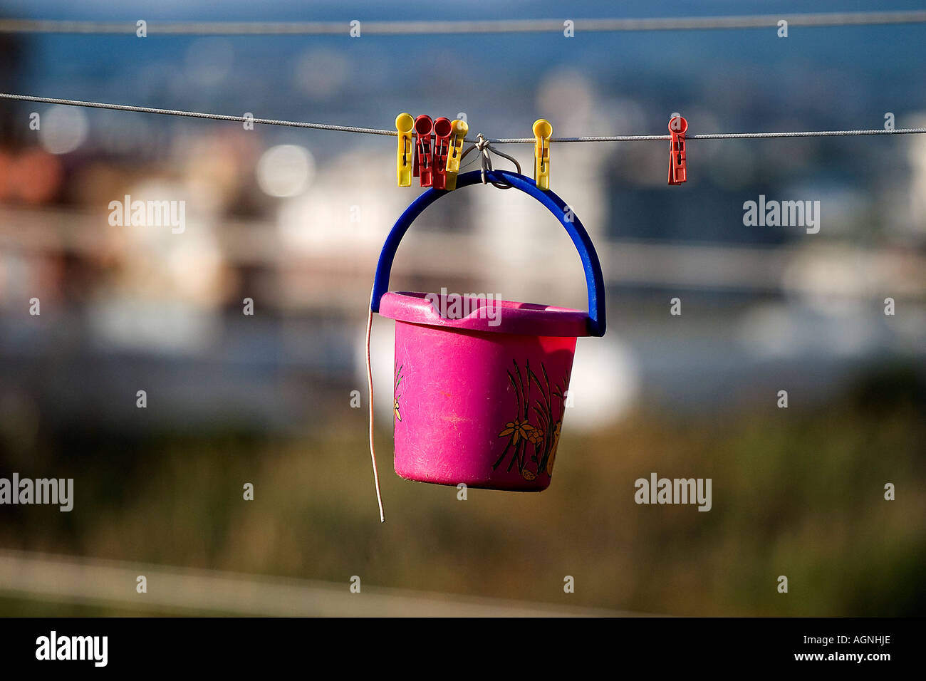 plastic bucket with clothes pins Stock Photo Alamy