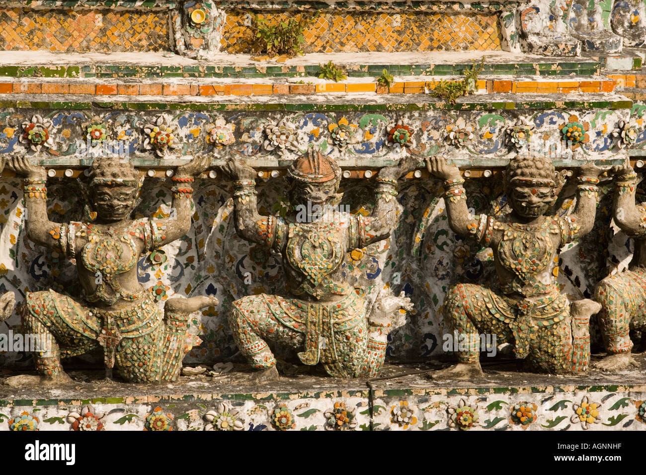 Part of Wat Arun Temple of Dawn with demon bearers Bangkok Thailand Stock Photo