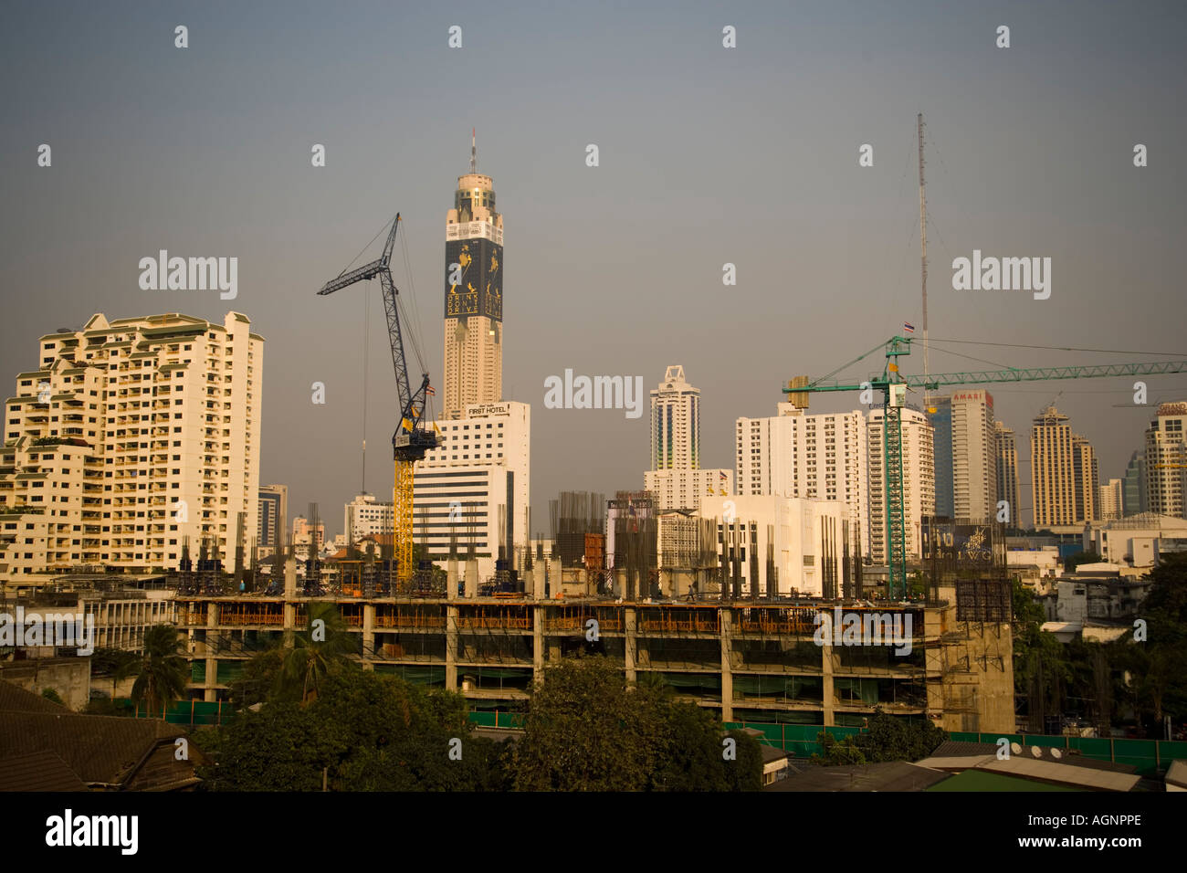 View over a constructions site to Baiyoke Tower II the tallest building in Thailand Ratchathewi Bangkok Thailand Stock Photo