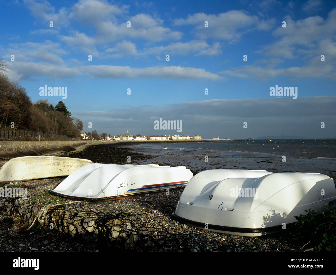 UPTURNED BOATS on Gallows Point Beaumaris Anglesey Wales UK Stock Photo