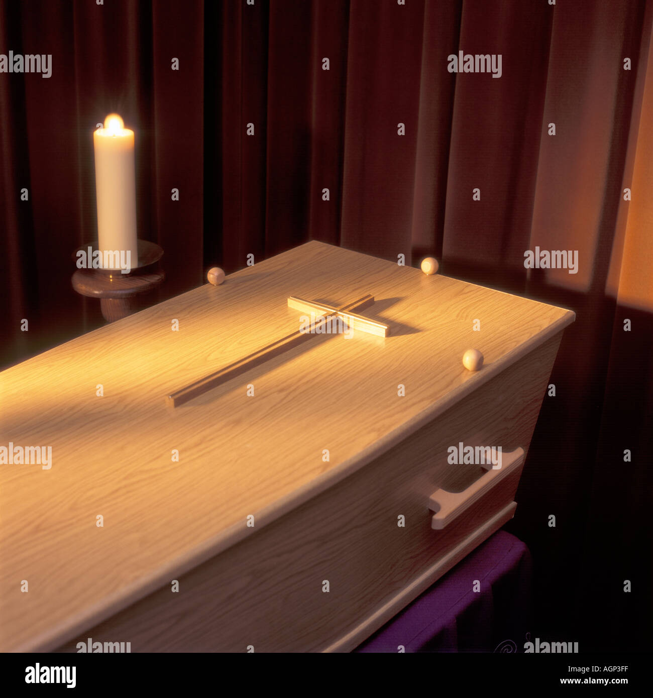 coffin with cross and candle Stock Photo - Alamy