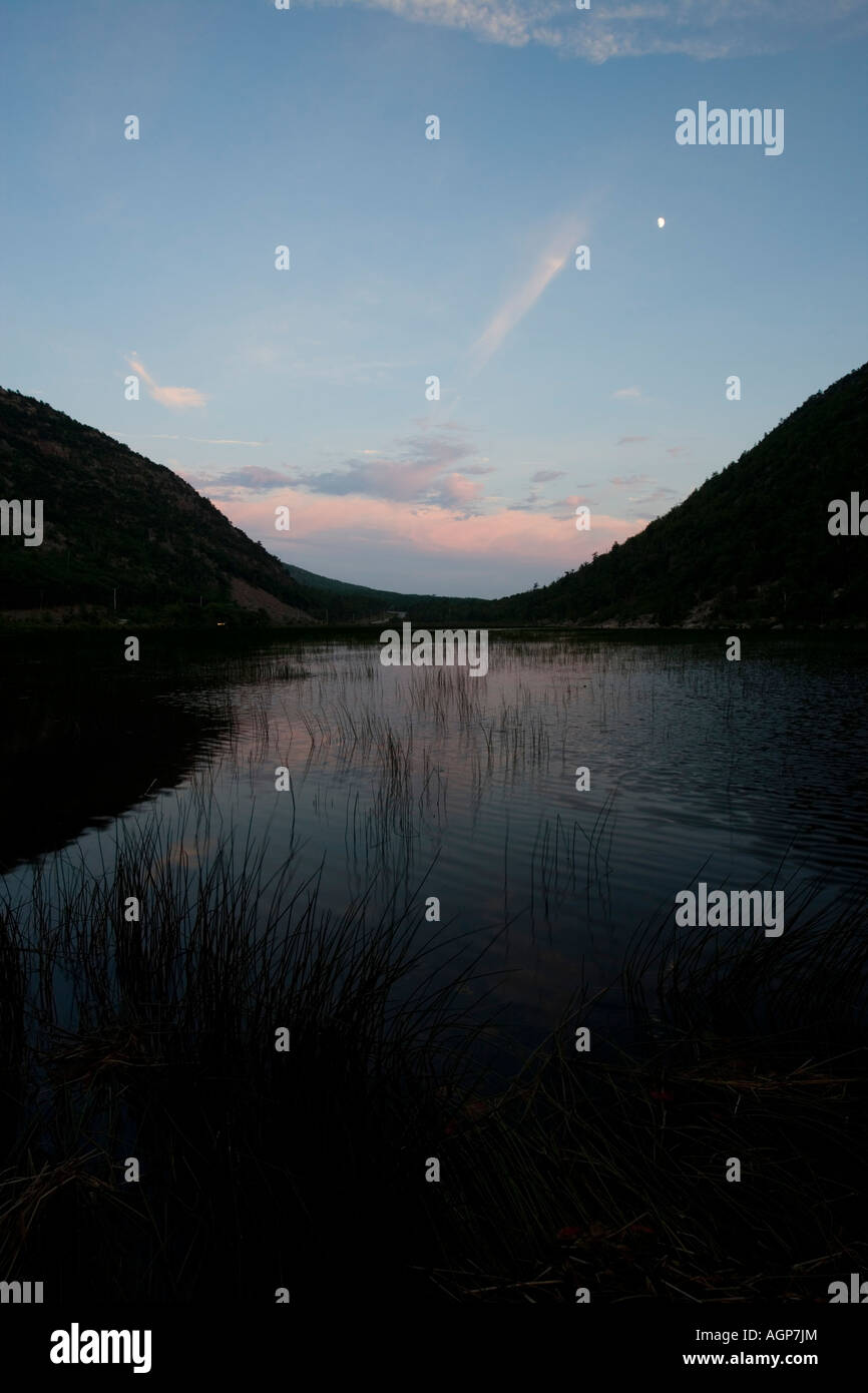 A glacial tarn pond known as The Tarn at dusk in Maine s Acadia