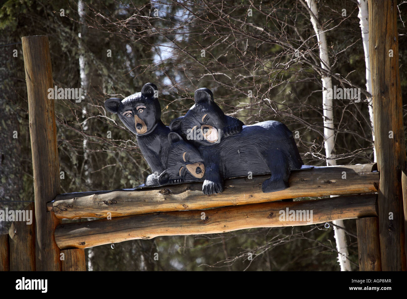 Three bears ornament on fence Stock Photo