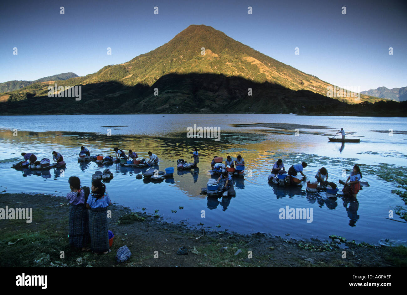 Guatemala Santiago de Atitlan, Women washing in lake Lago De Atitlan Stock Photo