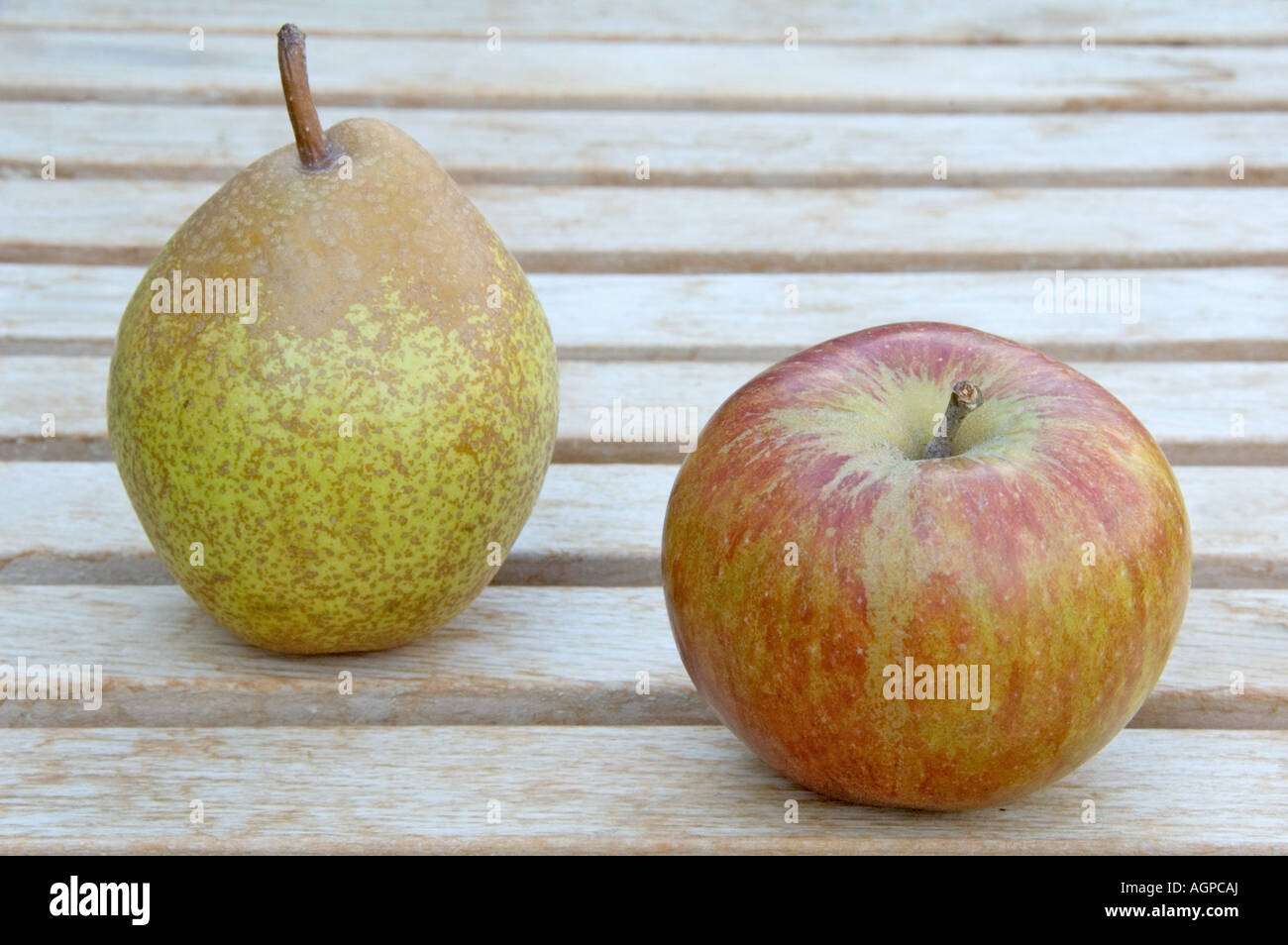 Cox s Apple and Rocha Pear on table Stock Photo
