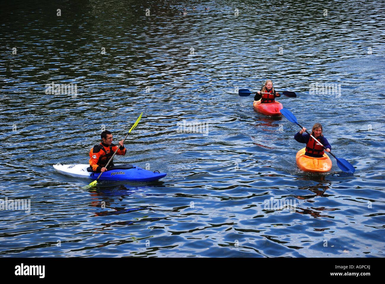 Children kayaking with instructor on River Thames, Pangbourne