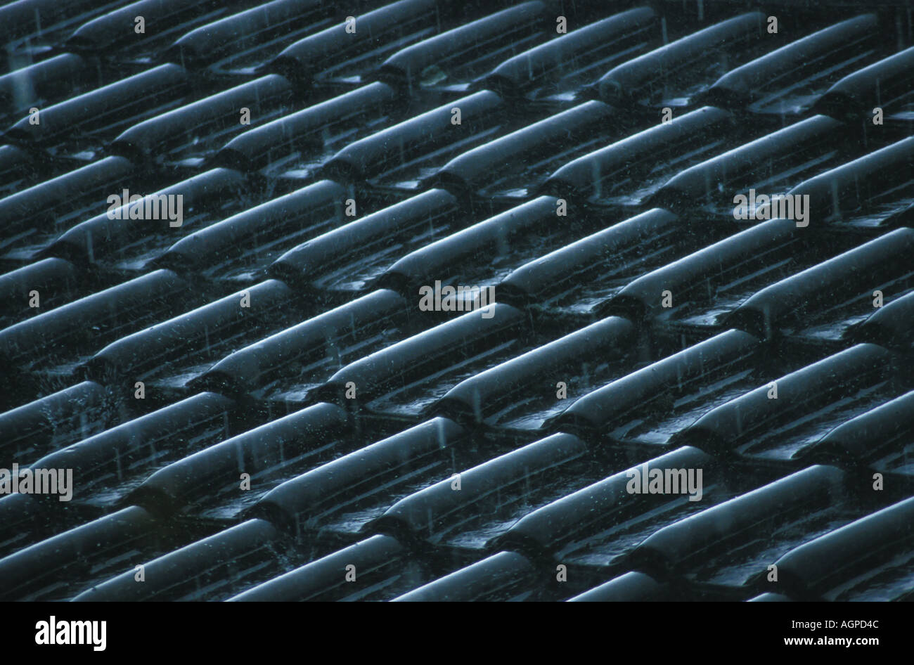 rain splashing on a roof Stock Photo Alamy