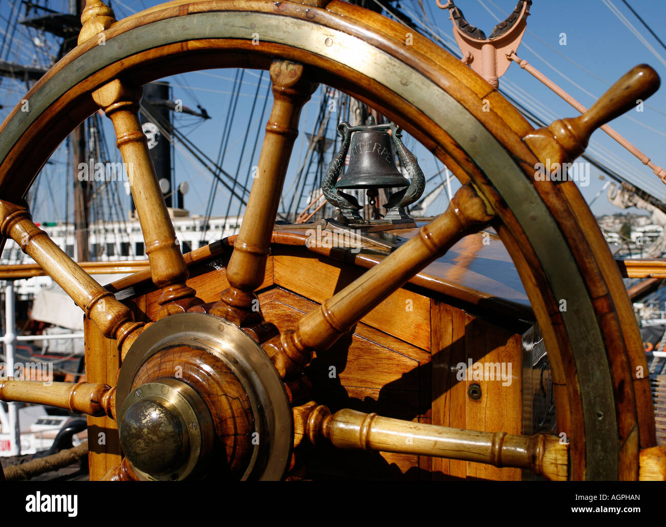 Ship wheel and bell of Star of India, built in 1863 as Euterpe Stock Photo