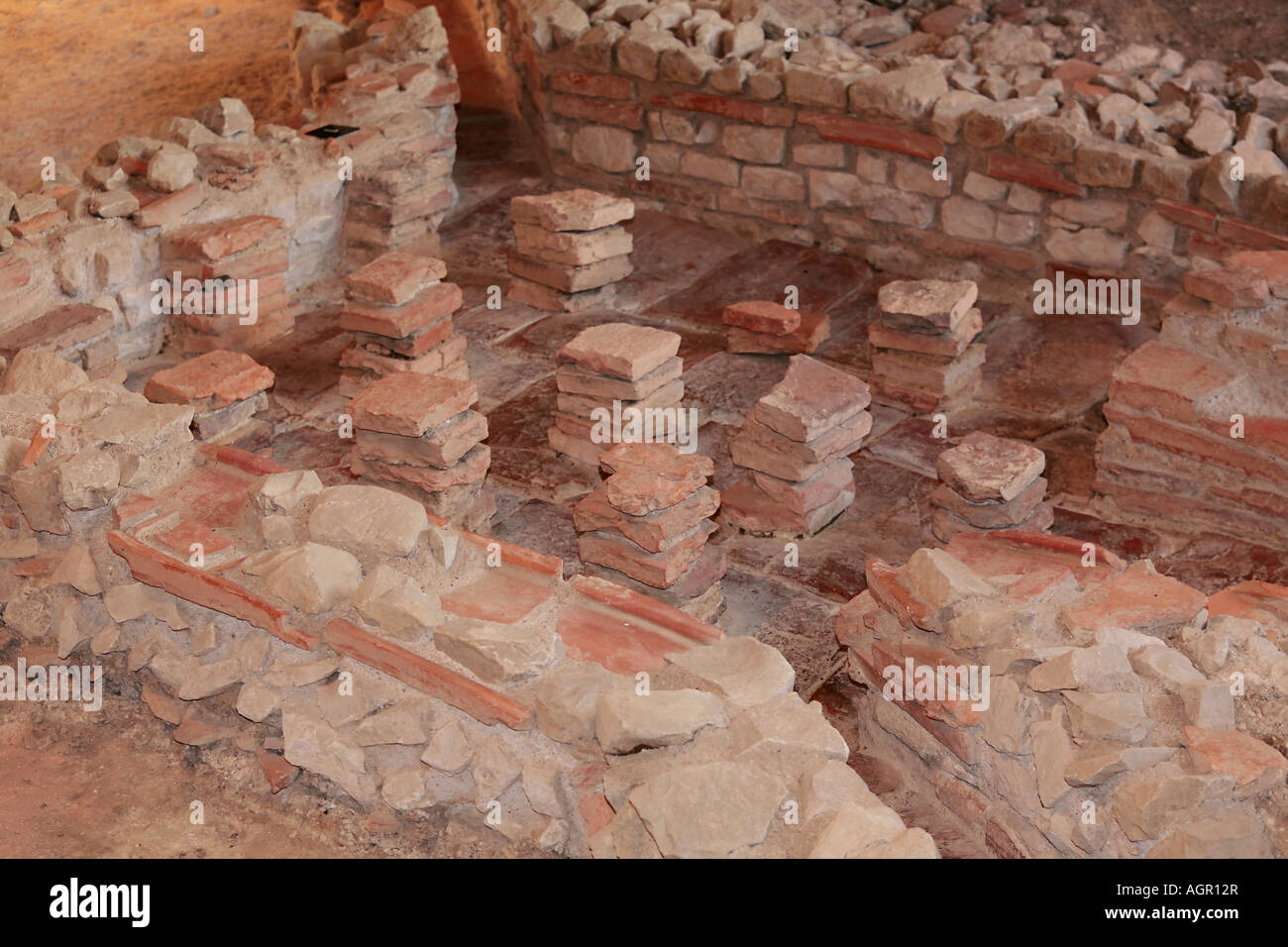 Hypocaust Roman system of central heating under mosaic floor at