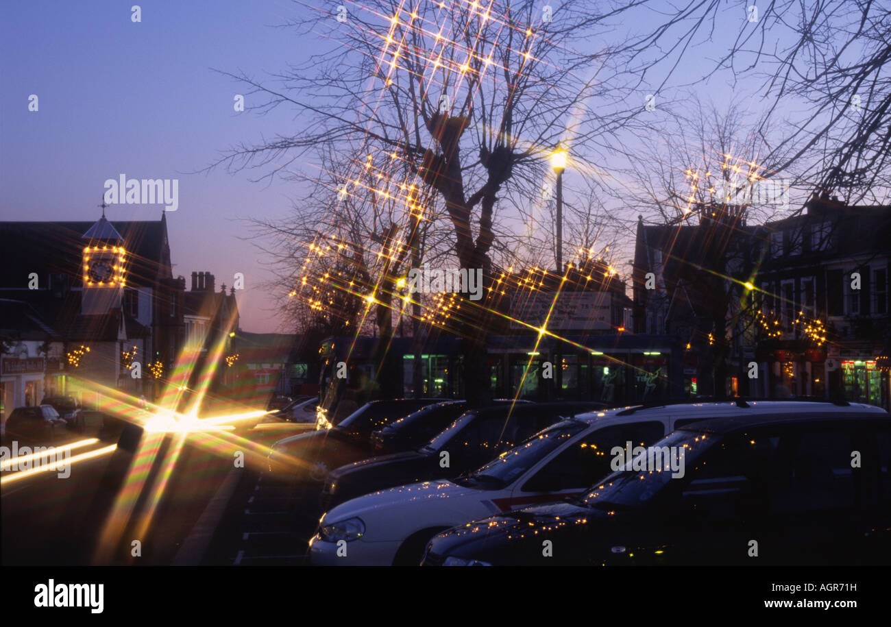 Winter early evening seasonal Christmas lights in the trees and on the