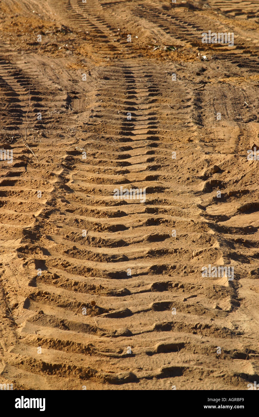 Tracks and wheel marks Earth mover tractors working dam building tyre tracks tread Stock Photo
