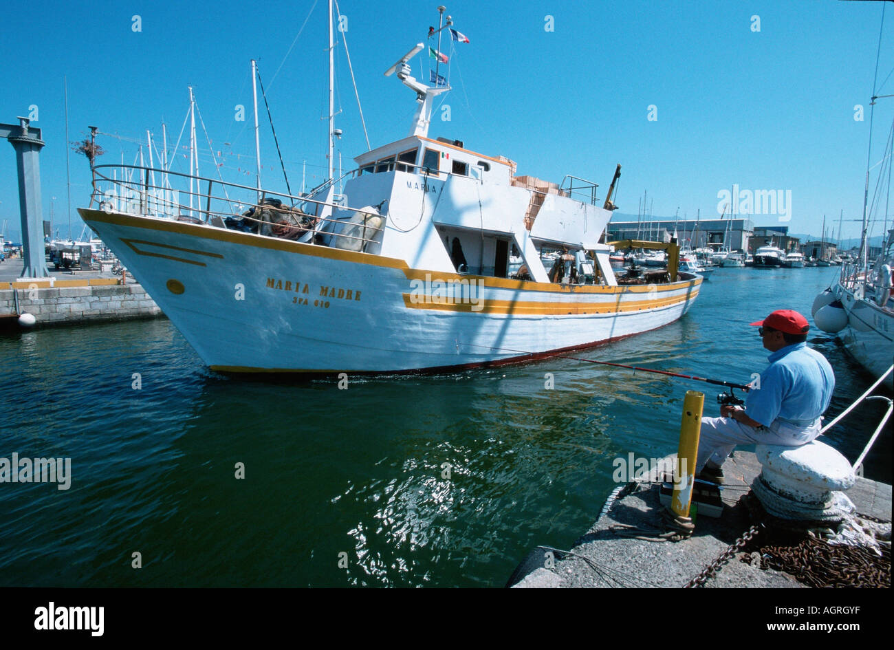 Fishing boat in harbour Stock Photo - Alamy