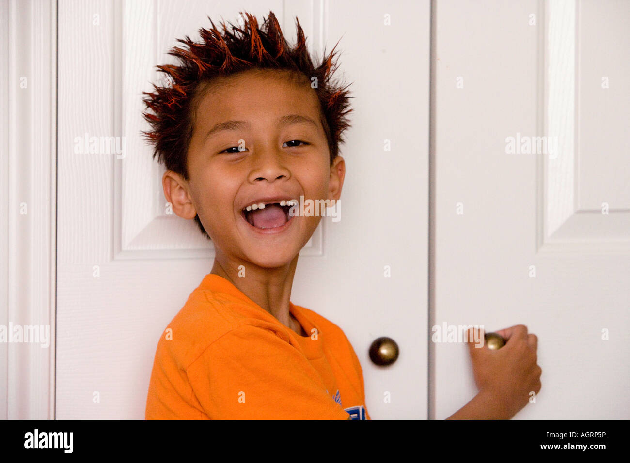 Young Asian boy with spiked hair Stock Photo - Alamy