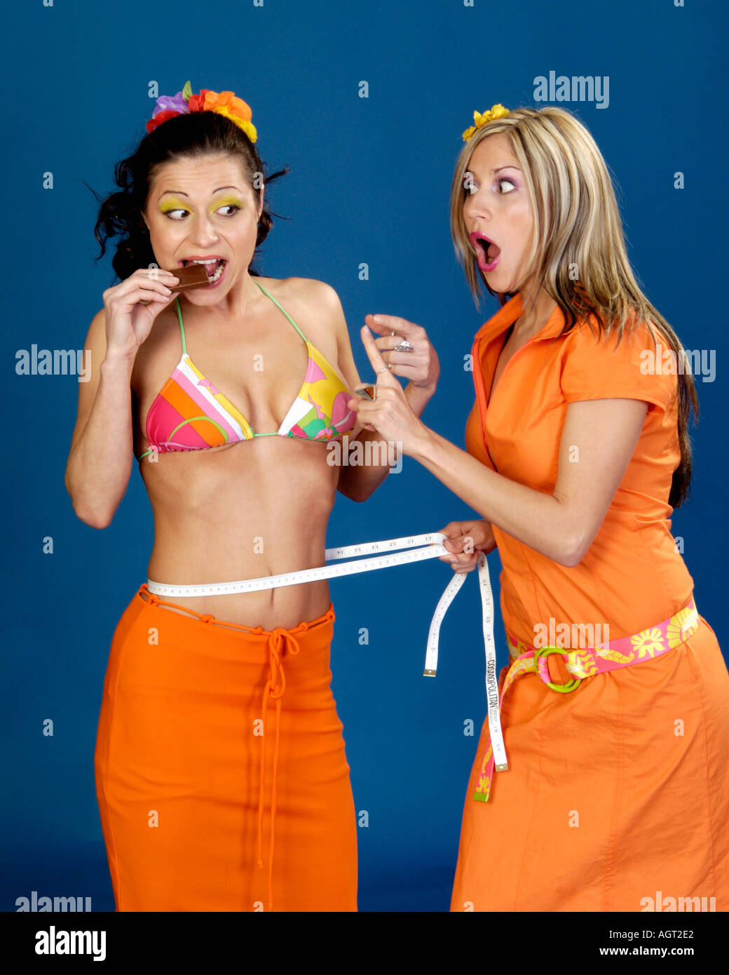 Woman warns friend about eating chocolate Stock Photo