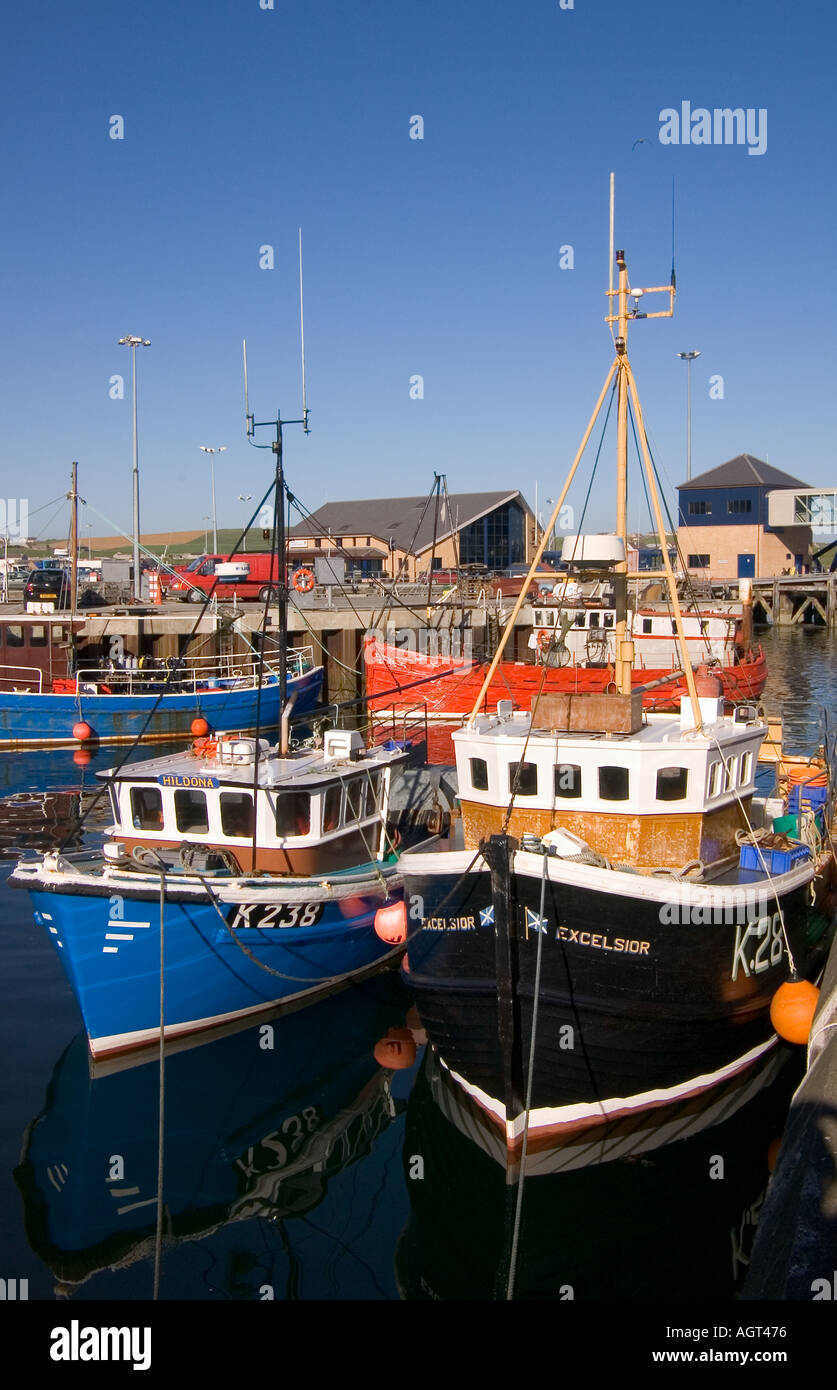dh Harbour STROMNESS ORKNEY Fishing boats berth at quayside quay Stock Photo