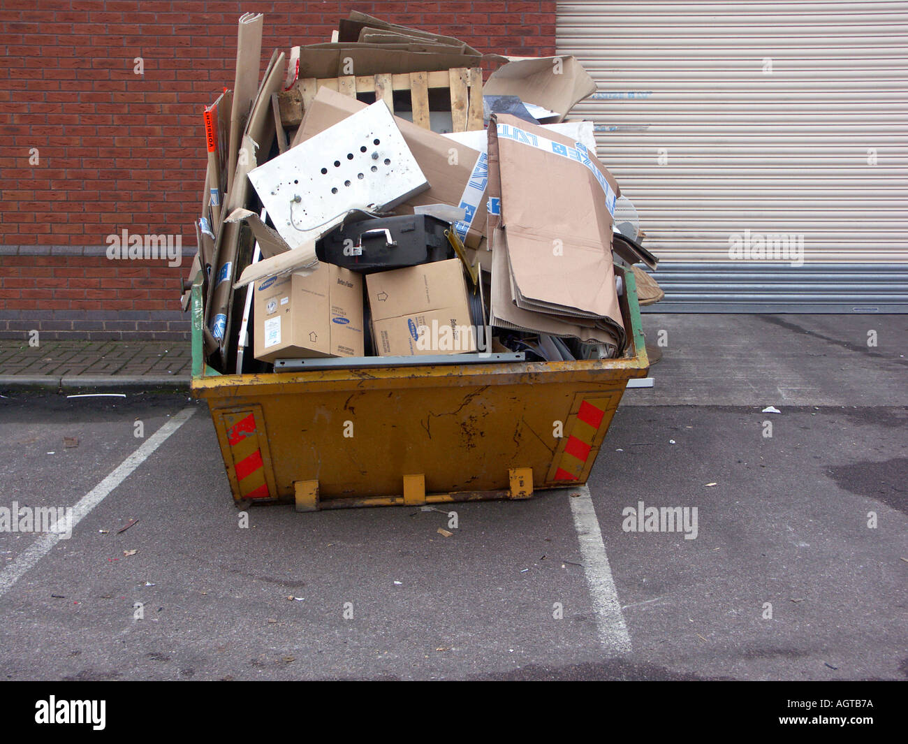 Overflowing Rubbish Skip Stock Photo Alamy