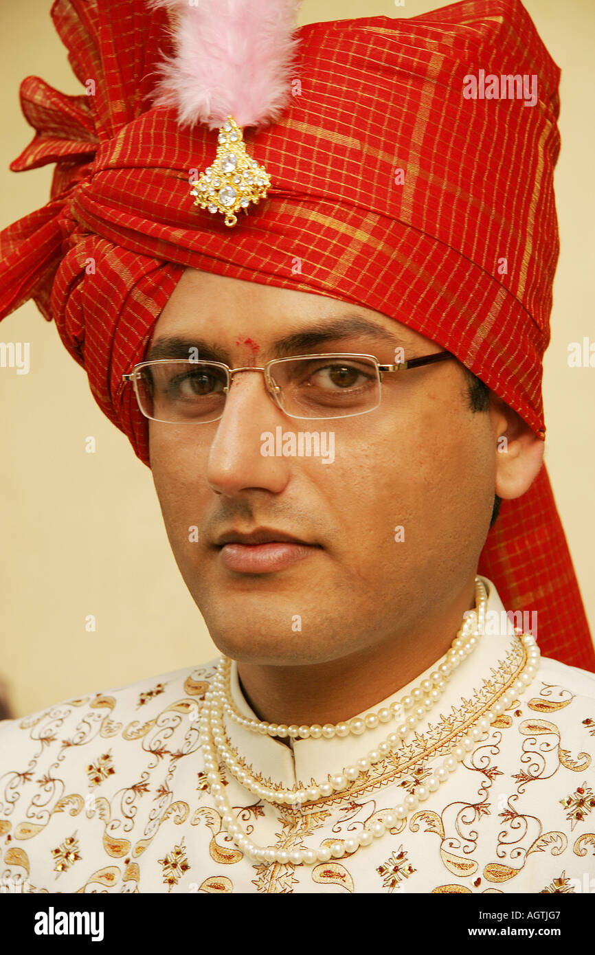 Indian Gujarati Bridegroom wearing turban with broach and embroidered