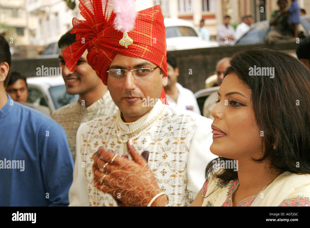 Indian Gujarati Bridegroom wearing turban and embroidered coat called