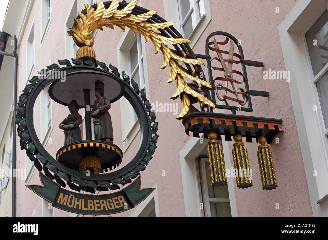 Old wrought iron tailor sign on Getreidegasse srteet. Salzburg, Austria. Stock Photo