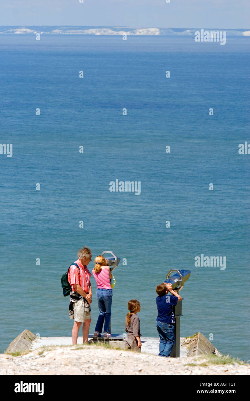 Tourists view the white cliffs of Dover in England from Cap Blanc Nez in the Pas de Calais department in Northern France Stock Photo