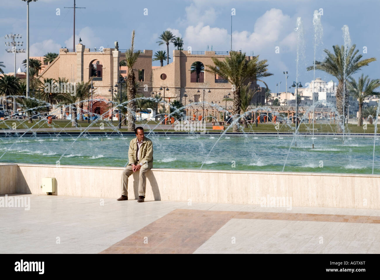 Tripoli, Libya. Green Square Fountain, National Museum in Background Stock Photo
