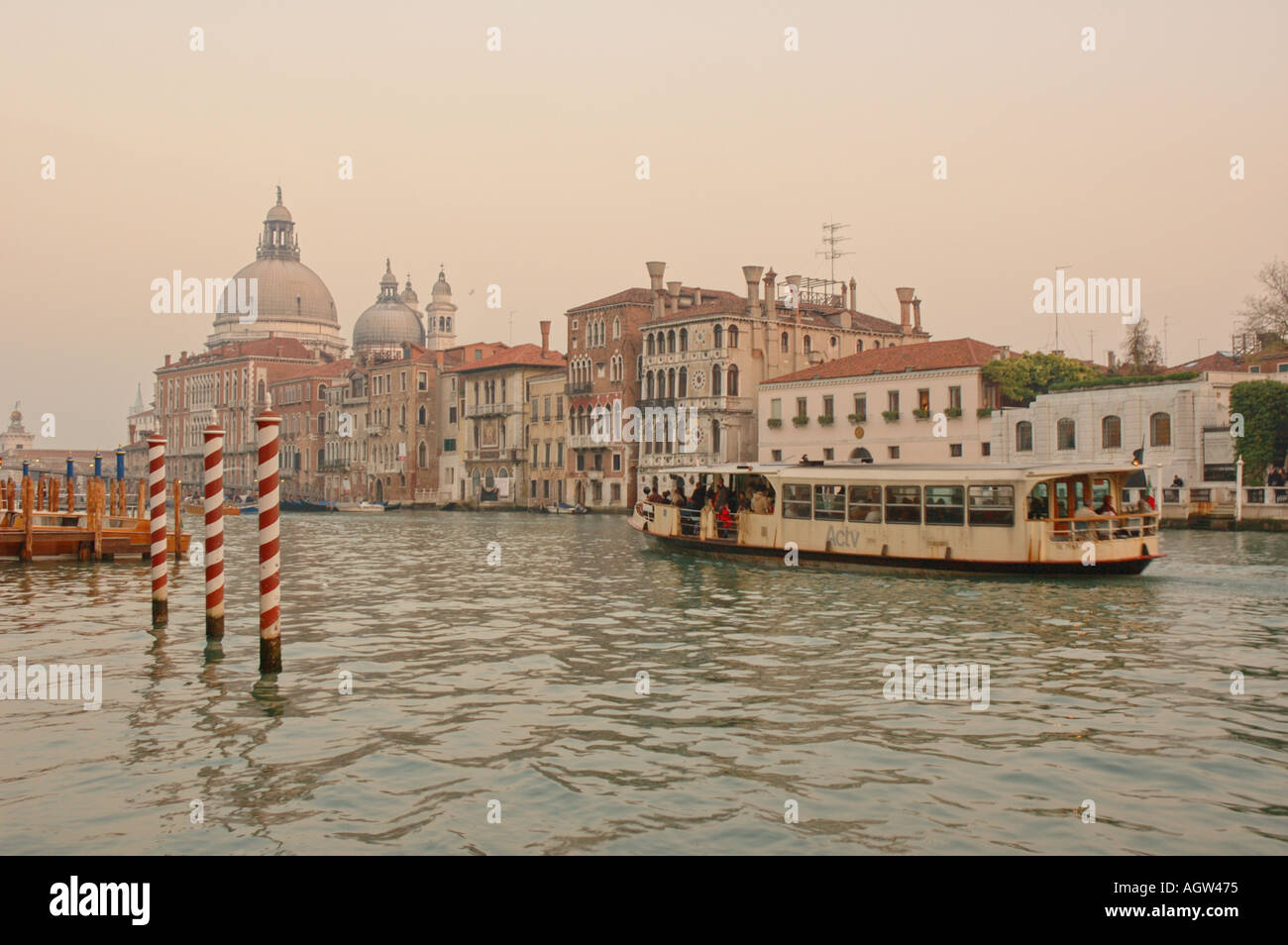 A vaporetto waterbus on the Grand canal near the Accademia Bridge in ...