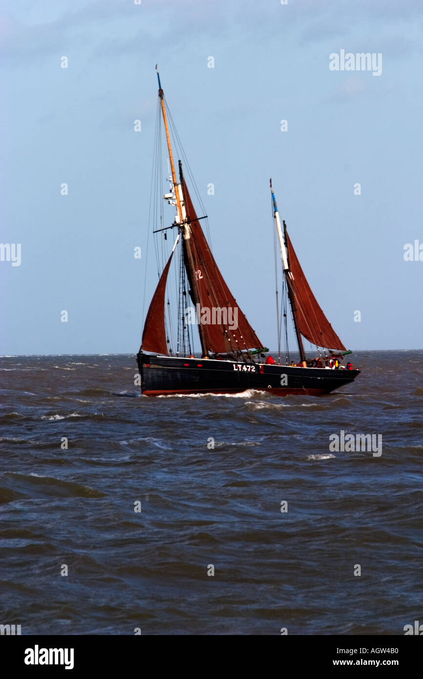 sail fishing boat off gt yarmouth Stock Photo Alamy