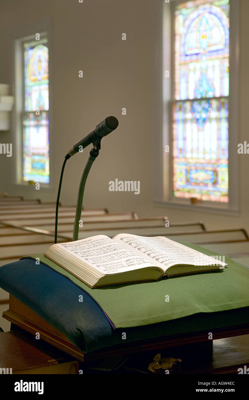 Church Pulpit with microphone bible pews and stained glass Brooklin