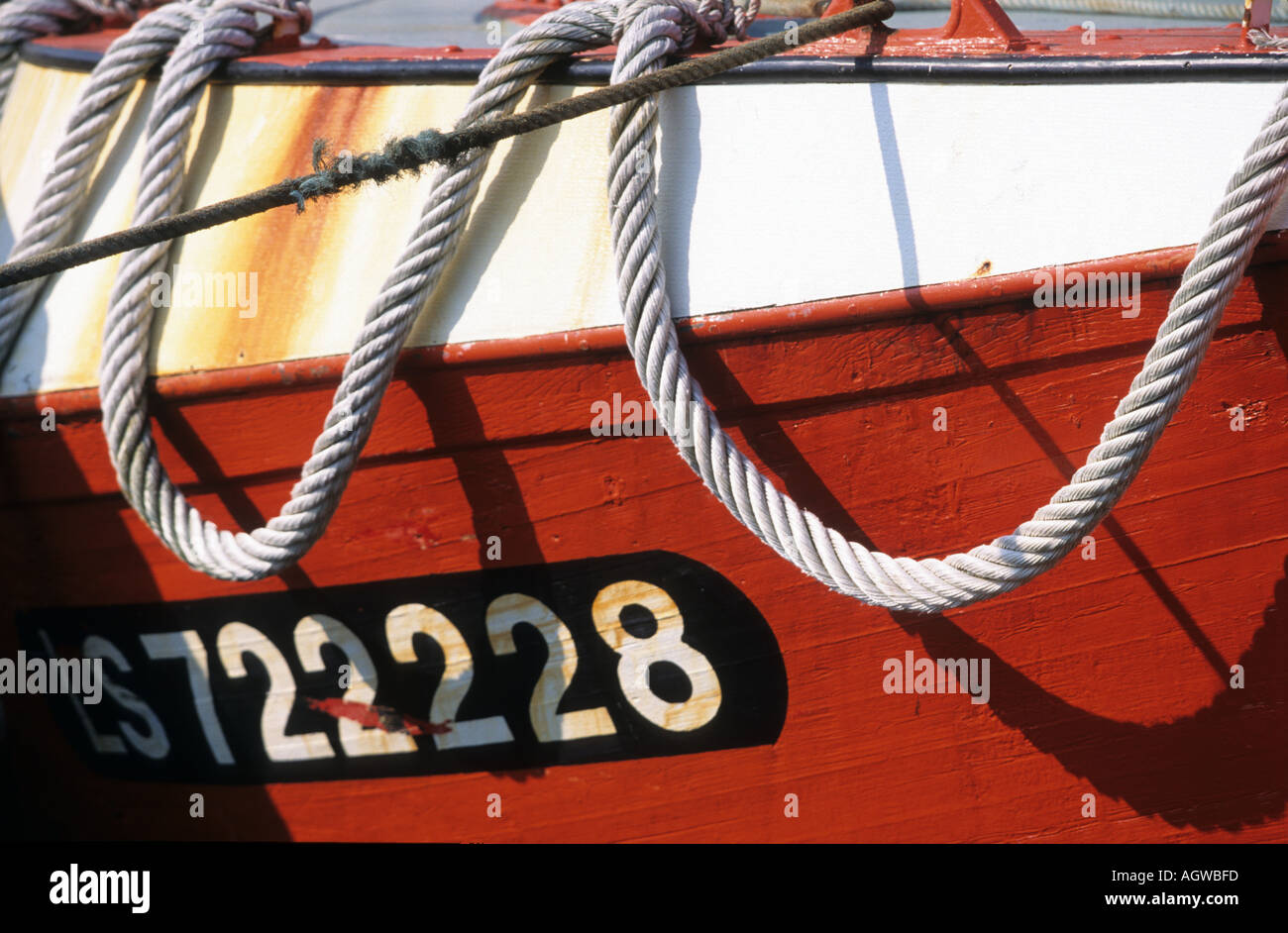 Wooden fish boat in typical colors in France Stock Photo