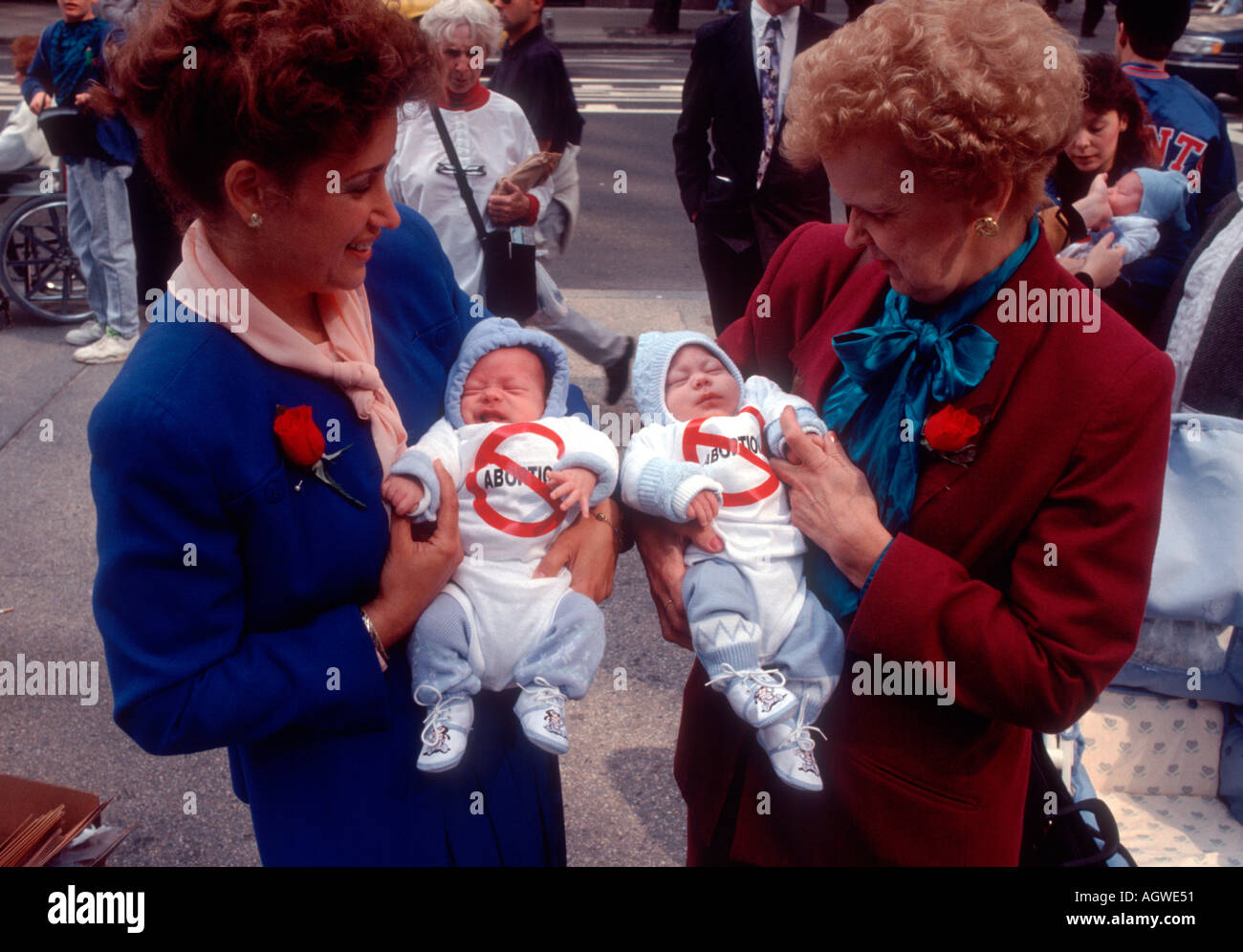 Women hold babies rescued from abortions at a Pro Life Demo in front of St Patrick s Cathedral in 1991  Stock Photo