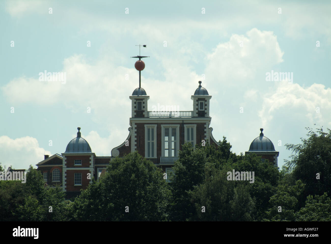 Greenwich Observatory historical raised red Time Ball signal above Octagon room Flamsteed House about to drop at 1.00pm check time Greenwich Park UK Stock Photo