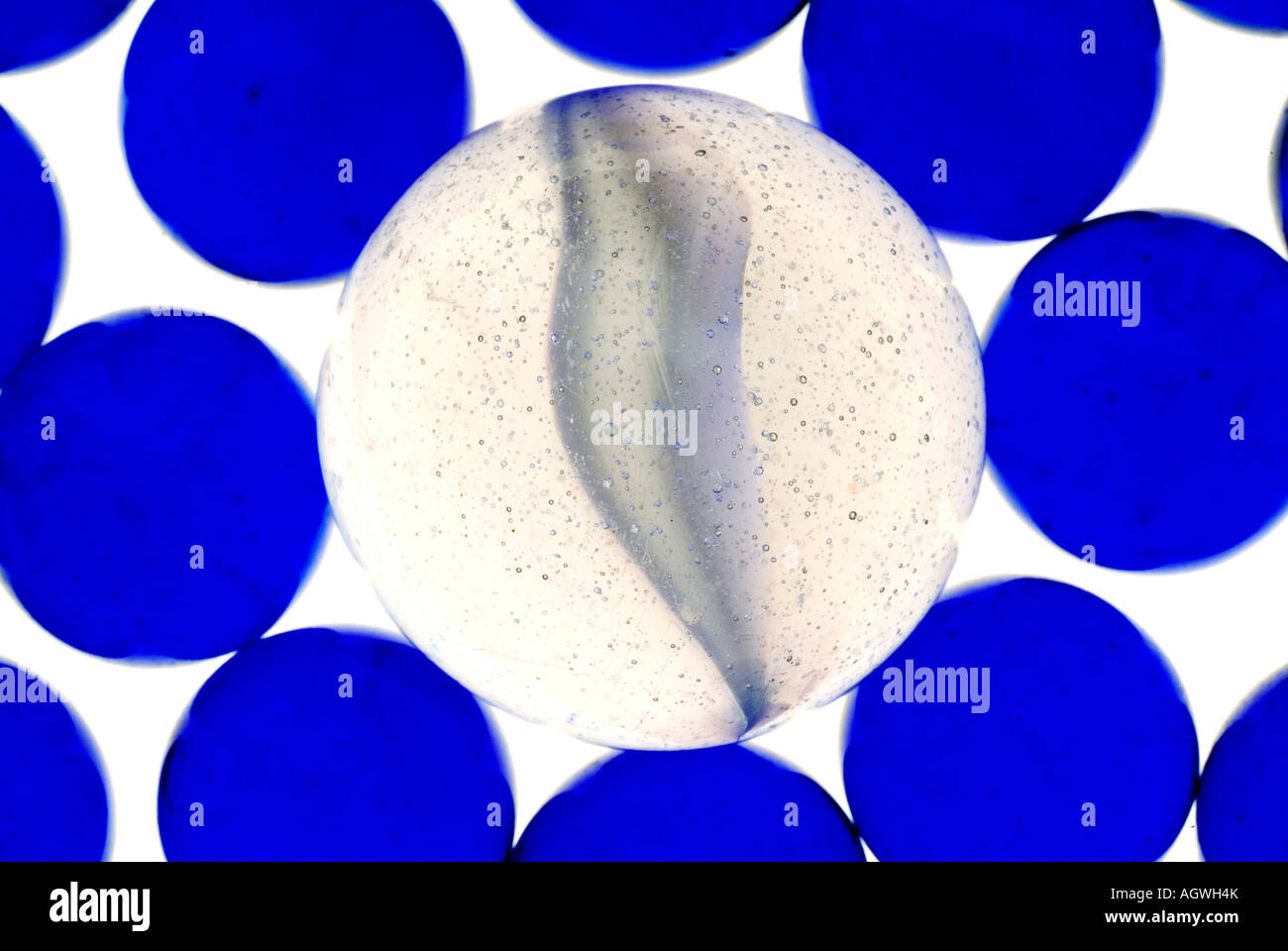 Group of marbles with large clear marble in center Stock Photo Alamy